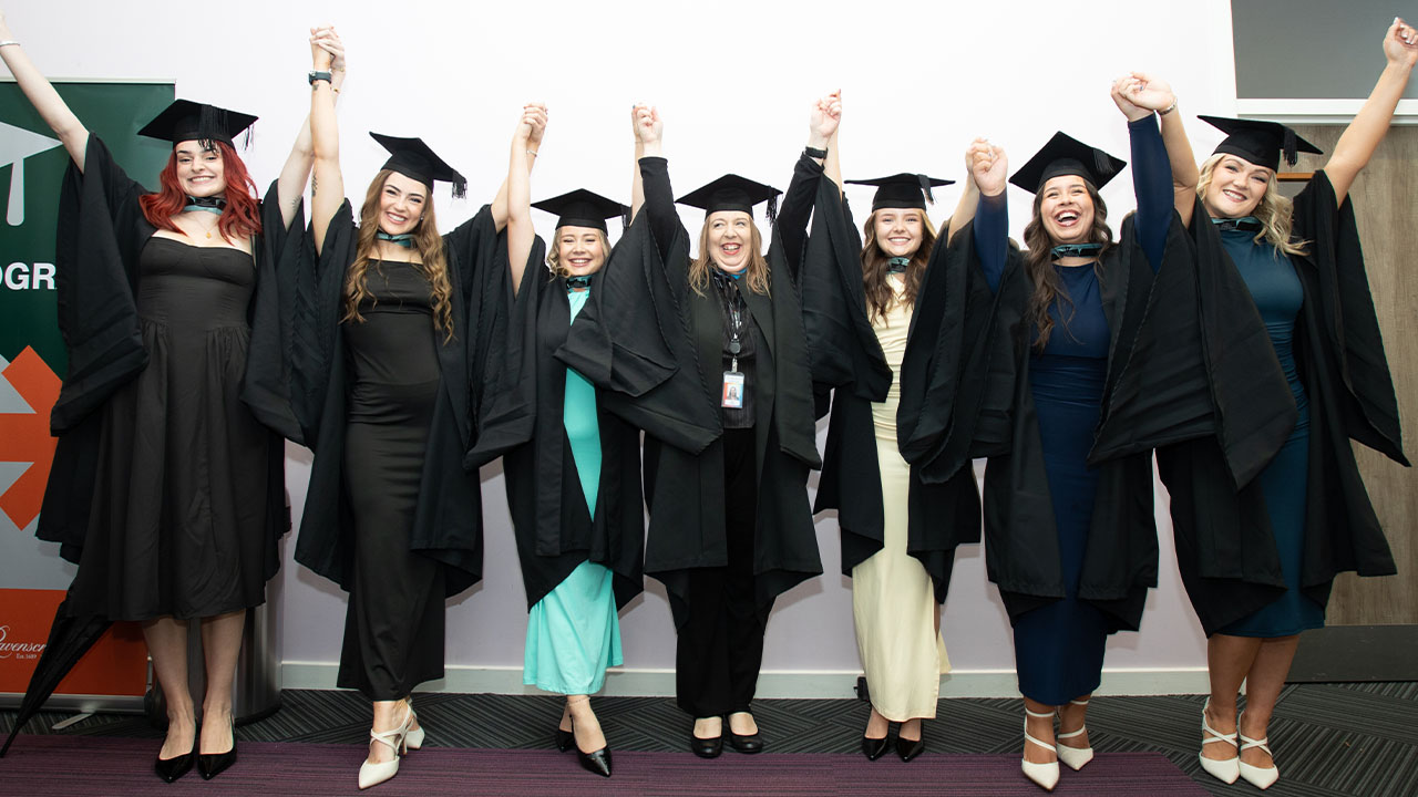 Graduates celebrating their graduation day