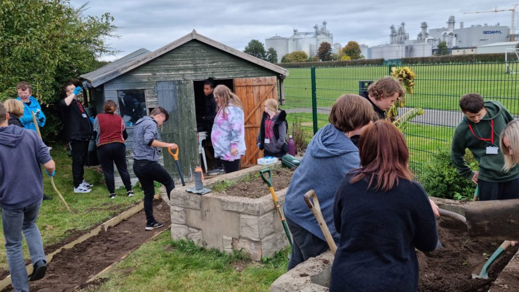 Students gardening 