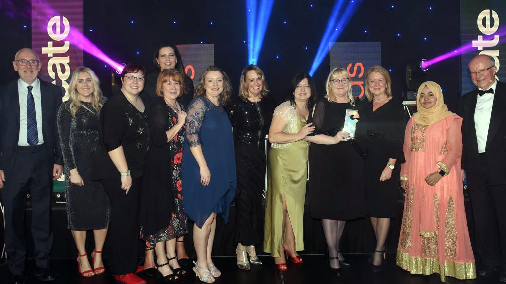 Staff celebrating Wakefield College's win 