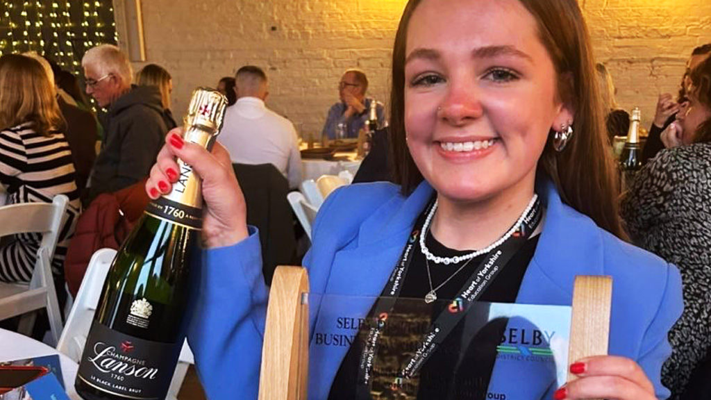 Student with Business Awards prize