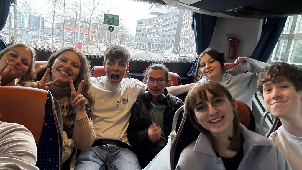Several students on a bus in Amsterdam