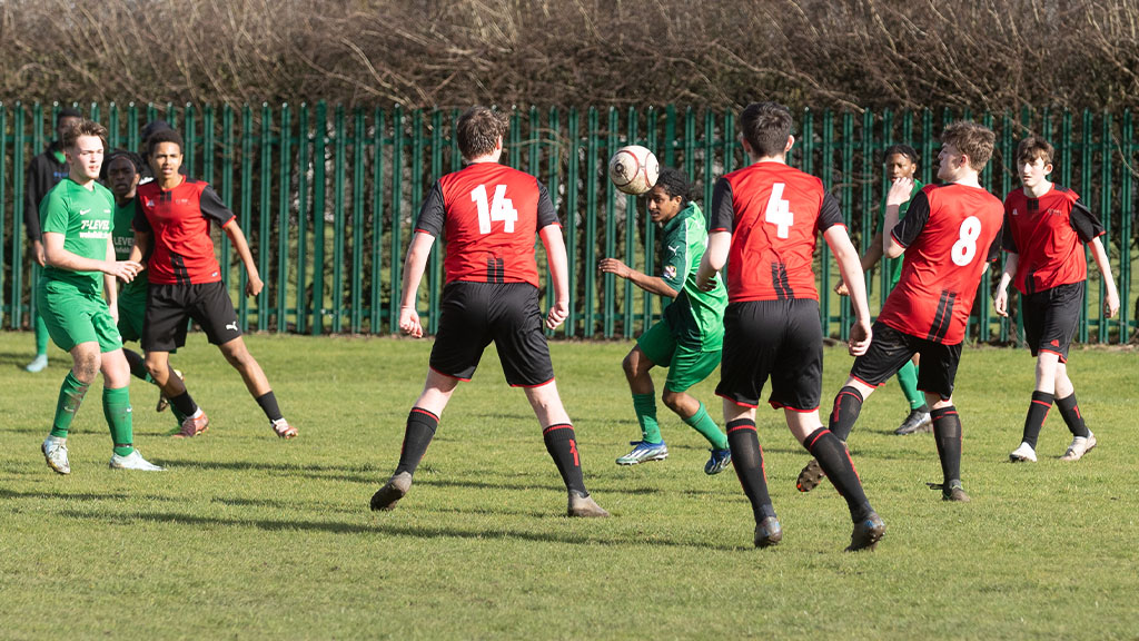 Sport students playing footbal