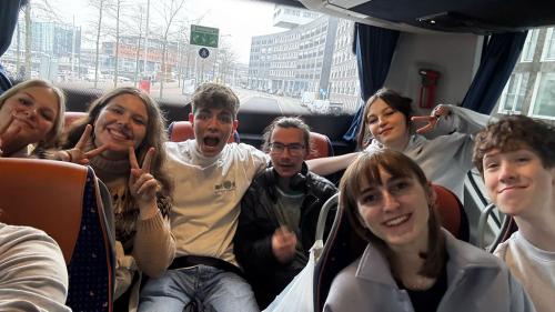 Several students on a bus in Amsterdam