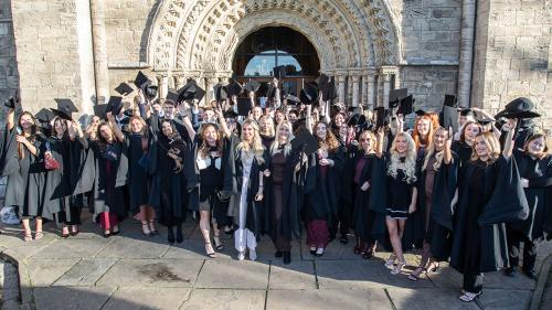 Students celebrating their graduation at Selby Abbey